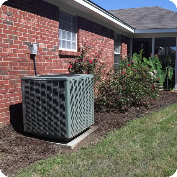 air conditioner system next to home